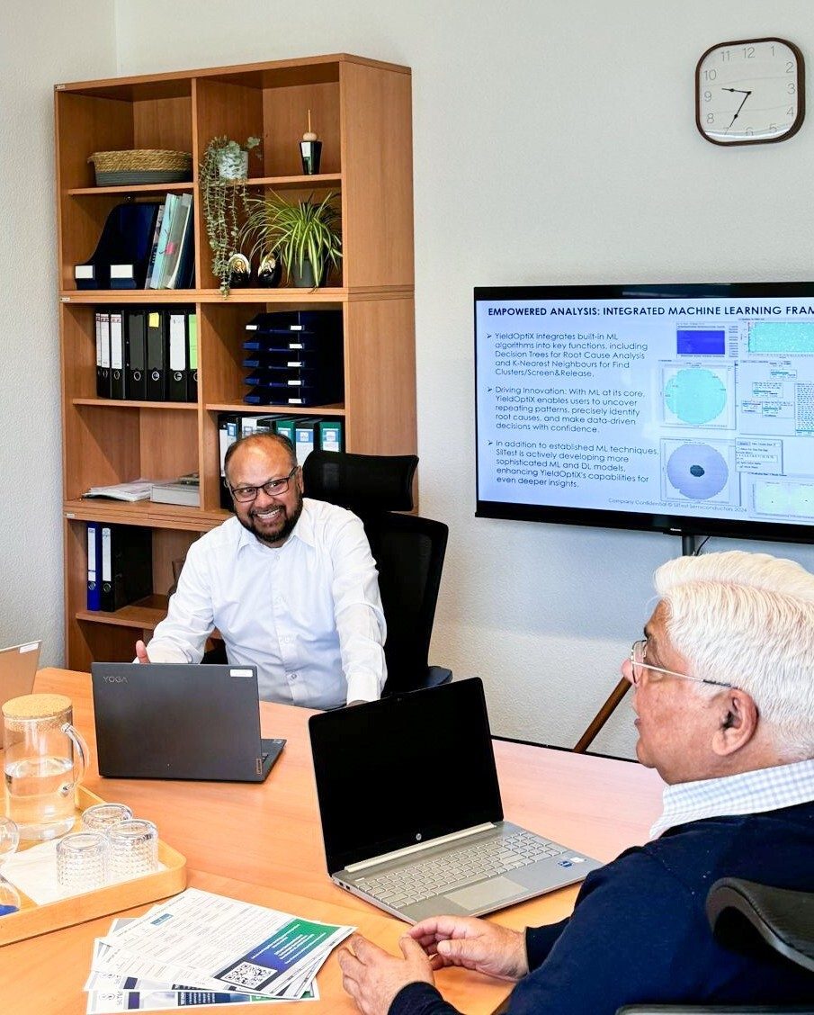 SilTest engineers reviewing YieldOptiX machine learning analysis